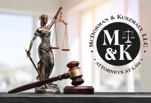 balancing scales and gavel with logo